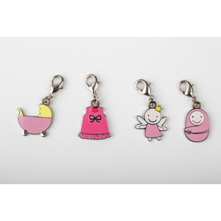 Charms rosa per bimba assortiti in quattro soggetti 1,5 cm…