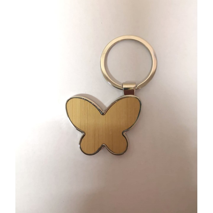 Portachiavi farfalla in legno e acciaio 5 cm | CarinCasa