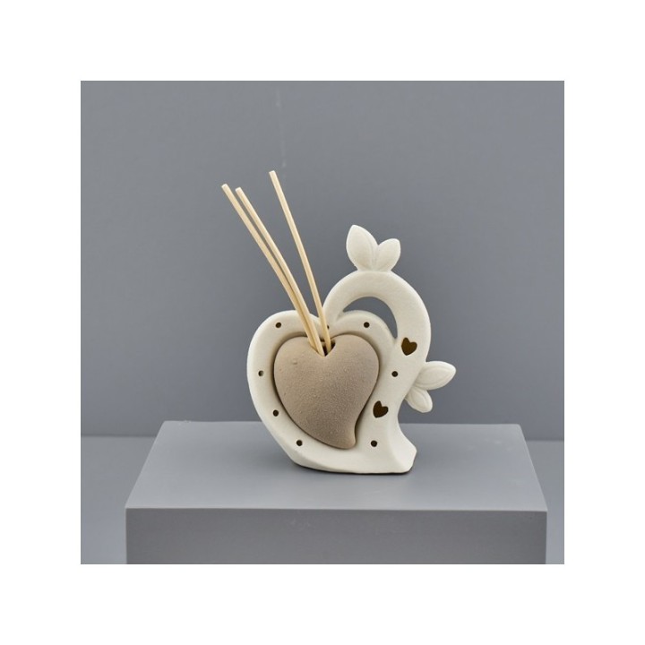 Diffusore per ambienti con coppia a cuore in ceramica bianca e luce LE