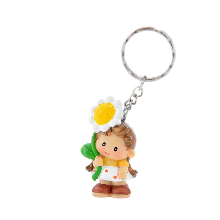 Portachiavi bimba Daisy con fiore in resina colorata