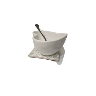 Antipastiera formaggiera con cucchiaio acciaio e mattonella…