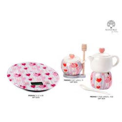 Barattolo per miele con mestolo in porcellana con decoro cuori rosa