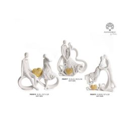 Statuetta sposi seduti sul simbolo dell'infinito con cuore oro in resina 11 cm