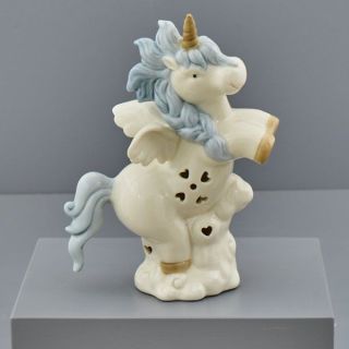 Unicorno alato celeste in porcellana con cuori traforati