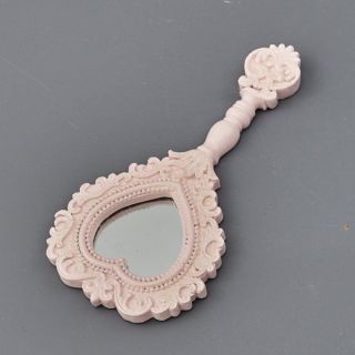 Specchietto in resina rosa con cornice decorata