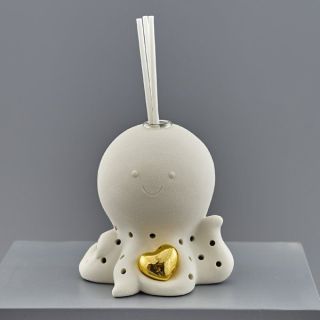 Diffusore per ambiente polpo in ceramica con cuore dorato