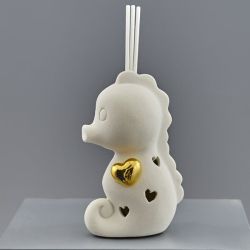 Diffusore per ambiente cavalluccio marino in ceramica con cuore dorato