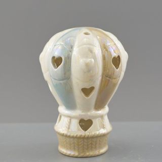 Mongolfiera in ceramica con cuori dorati