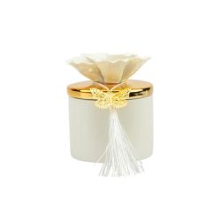 Scatola in porcellana bianca piccola con coperchio oro e fiore bianco con candela profumata