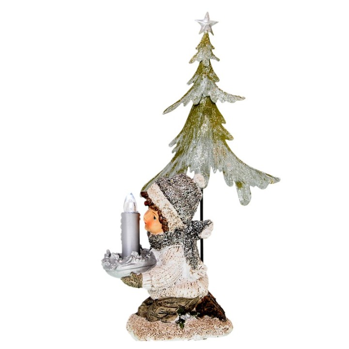 Statuetta bimba in ginocchio con candela e albero di Natale argentato,