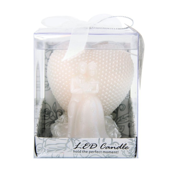Candela led a forma di cuore con sposi