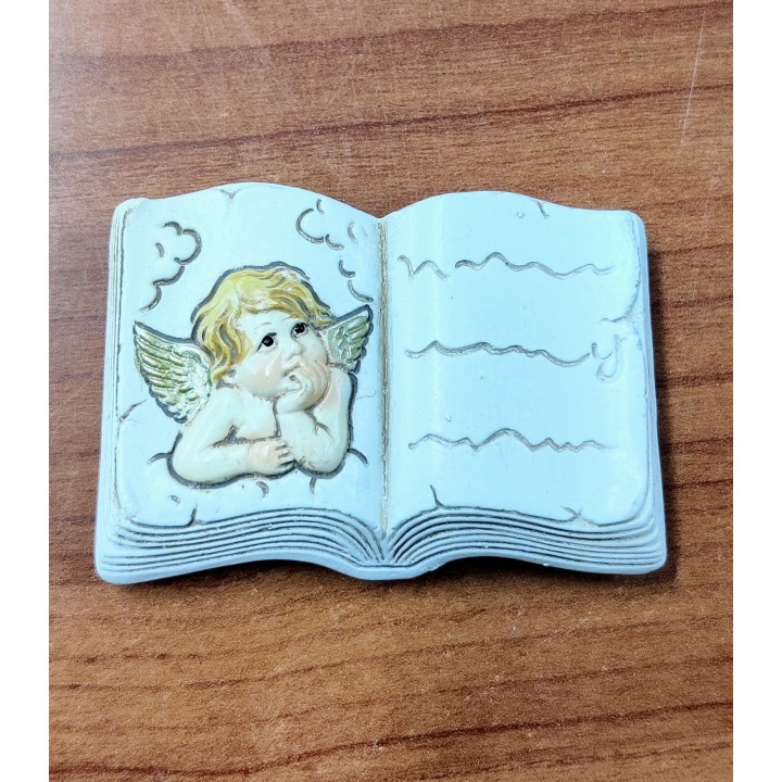 Magnete a forma di libro aperto con angioletto in resina